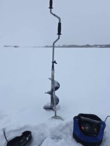 Ice fishing .. A Auger and Vexilar Flasher on Bay of Quinte ...