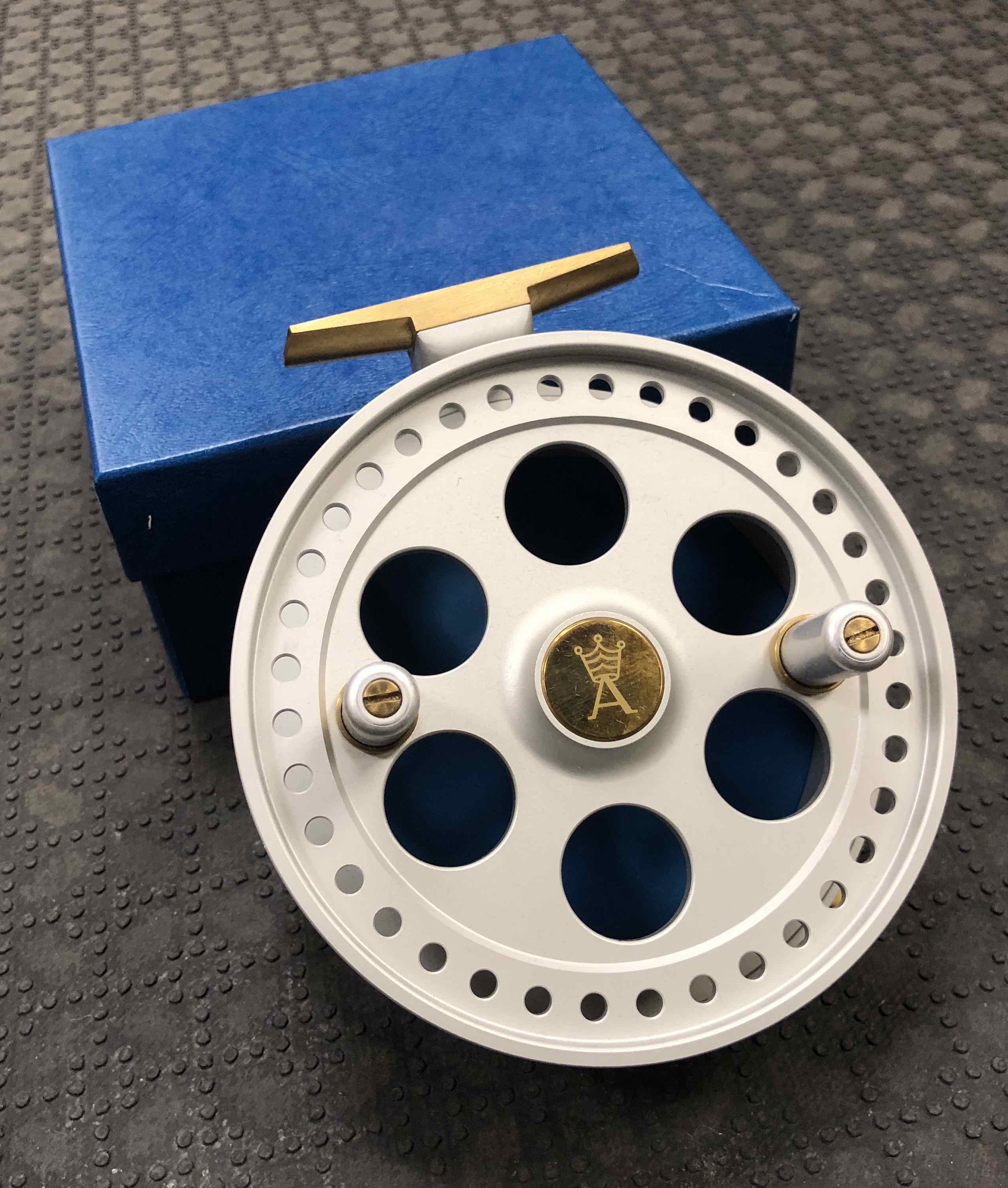 https://thefirstcast.ca/wp-content/uploads/2019/11/Arnold-Kingpin-Series-One-Regal-450-Round-Holed-Spool-Centerpin-Float-Reel-Serial-Number-0737BB.jpg