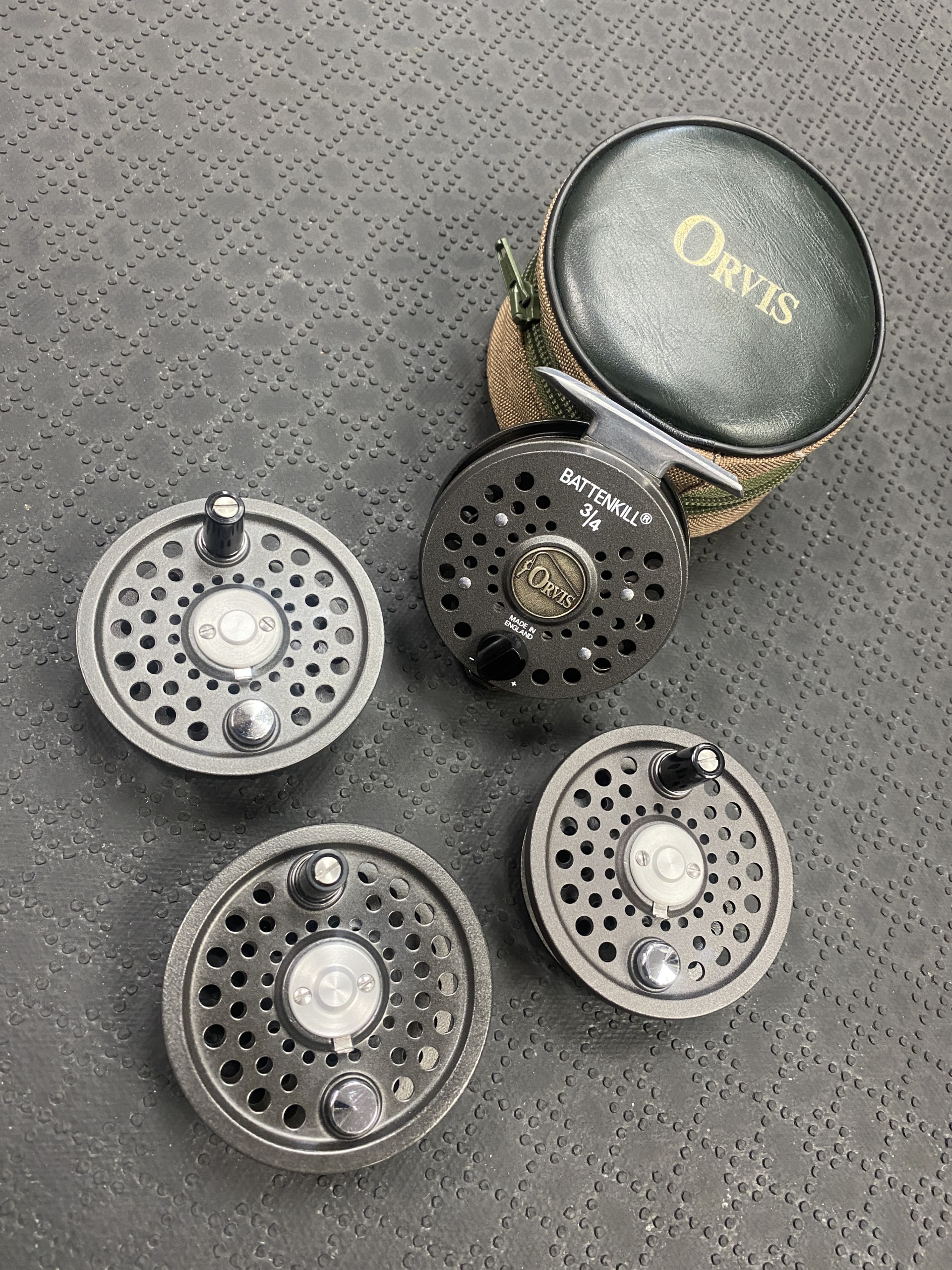 https://thefirstcast.ca/wp-content/uploads/2021/08/Orvis-Battenkill-34-Made-in-England-Fly-Reel-and-3-Spare-Spools-A-scaled.jpg