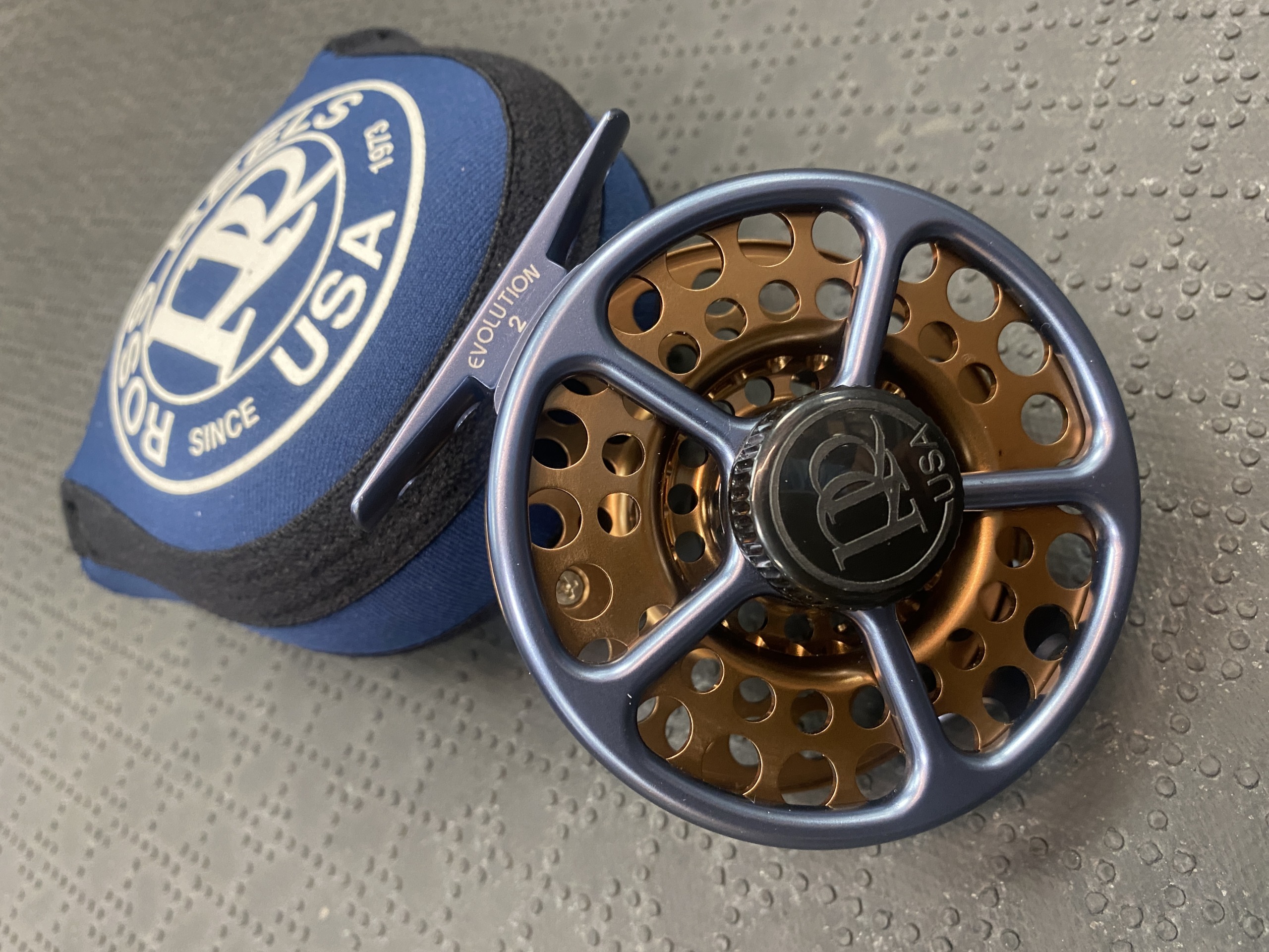 SOLD! – Ross Evolution Number 2 Fly Reel – Blue / Copper – LIKE NEW! – $200  – The First Cast – Hook, Line and Sinker's Fly Fishing Shop